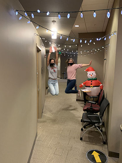 Students jumping in the hallway.