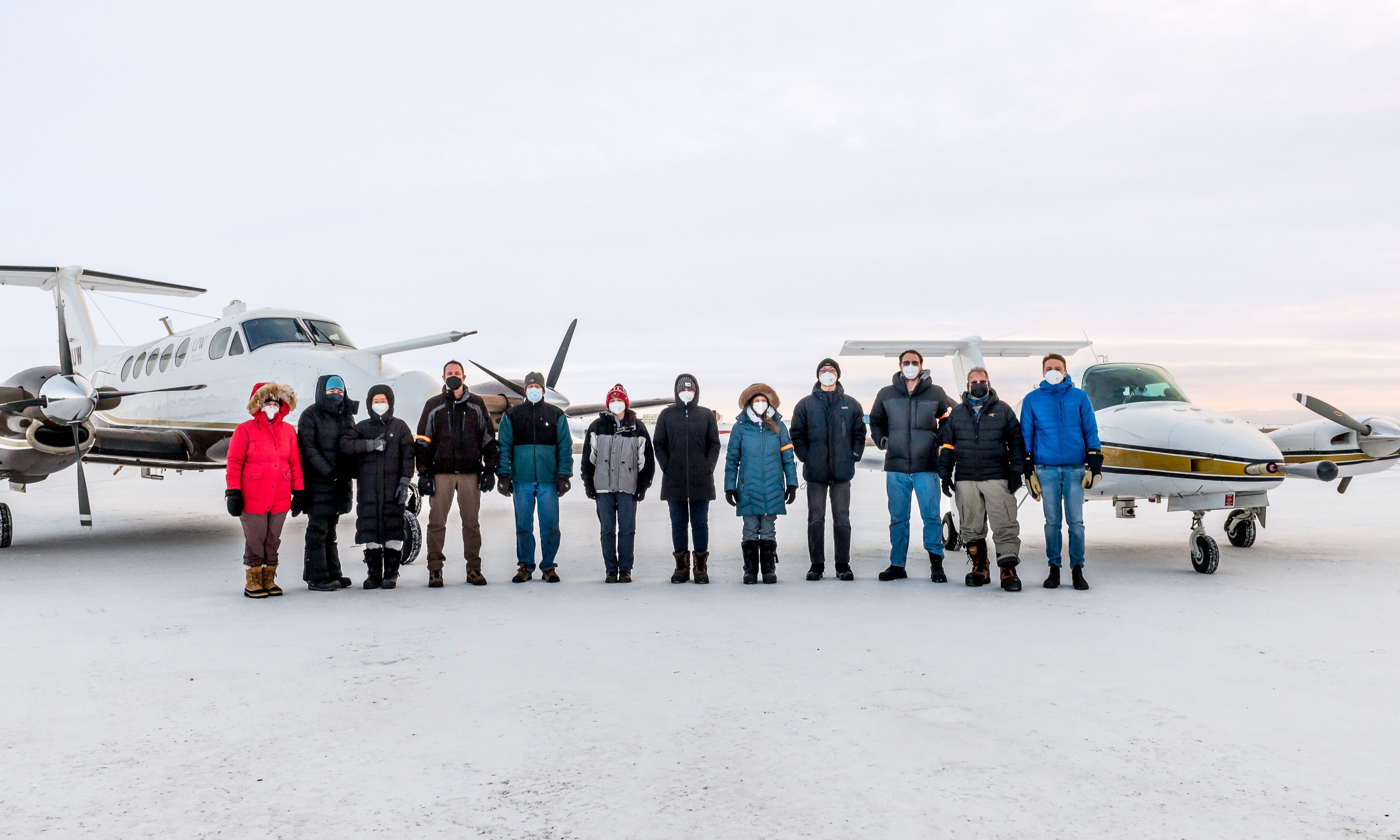 Research crew around the two aircraft
